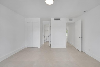 Welcome to this beautifully renovated 2-bedroom 2-bathroom condo on Wynmoor Golf Course in Florida - for sale on GolfHomes.com, golf home, golf lot