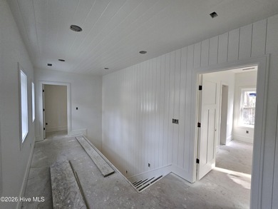 Tucked beneath the live oaks of the Bald Head Island Maritime on Bald Head Island Golf Club in North Carolina - for sale on GolfHomes.com, golf home, golf lot