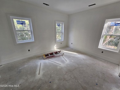 Tucked beneath the live oaks of the Bald Head Island Maritime on Bald Head Island Golf Club in North Carolina - for sale on GolfHomes.com, golf home, golf lot