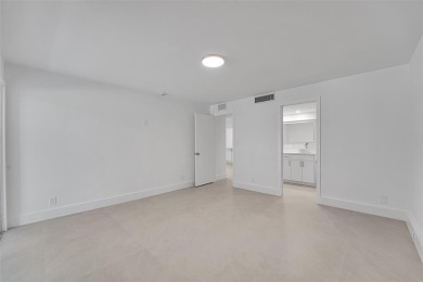 Welcome to this beautifully renovated 2-bedroom 2-bathroom condo on Wynmoor Golf Course in Florida - for sale on GolfHomes.com, golf home, golf lot