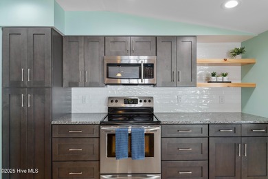 Location, Location, Location! This charming coastal cottage is on Founders Club At St. James Plantation in North Carolina - for sale on GolfHomes.com, golf home, golf lot