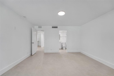 Welcome to this beautifully renovated 2-bedroom 2-bathroom condo on Wynmoor Golf Course in Florida - for sale on GolfHomes.com, golf home, golf lot