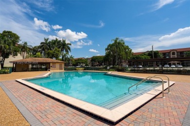 Welcome to resort stye living in Century Village! This 1 Bed/ 1 on Flamingo Lakes Country Club in Florida - for sale on GolfHomes.com, golf home, golf lot