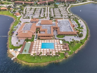 Welcome to resort stye living in Century Village! This 1 Bed/ 1 on Flamingo Lakes Country Club in Florida - for sale on GolfHomes.com, golf home, golf lot