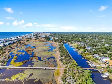 Location, Location, Location! This charming coastal cottage is on Founders Club At St. James Plantation in North Carolina - for sale on GolfHomes.com, golf home, golf lot