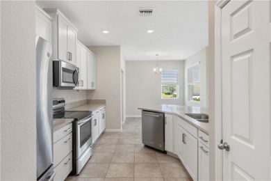 Welcome to this meticulously maintained 2019 home nestled in the on The Club At Pointe West in Florida - for sale on GolfHomes.com, golf home, golf lot