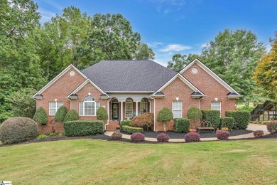 Stunning all-brick home located in the desirable Woodfin Ridge on Woodfin Ridge Golf Club in South Carolina - for sale on GolfHomes.com, golf home, golf lot