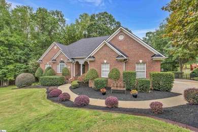 Stunning all-brick home located in the desirable Woodfin Ridge on Woodfin Ridge Golf Club in South Carolina - for sale on GolfHomes.com, golf home, golf lot