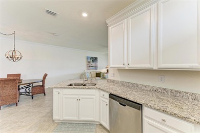 Imagine living in a community where neighbors become friends on Sarasota National Golf Club in Florida - for sale on GolfHomes.com, golf home, golf lot