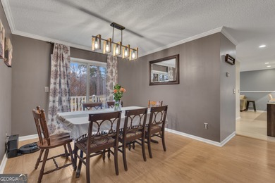 From sunsets over the fairway to your own private backyard oasis on Canongate At Flat Creek Club in Georgia - for sale on GolfHomes.com, golf home, golf lot