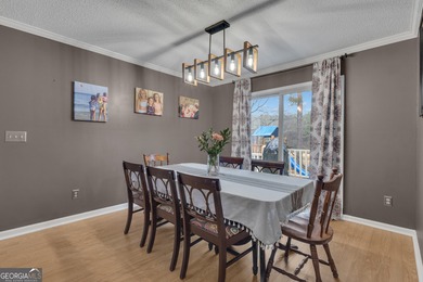 From sunsets over the fairway to your own private backyard oasis on Canongate At Flat Creek Club in Georgia - for sale on GolfHomes.com, golf home, golf lot