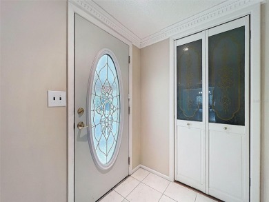 Lakefront Living in Beacon Woods Village with no flood insurance on Beacon Woods Golf Club in Florida - for sale on GolfHomes.com, golf home, golf lot
