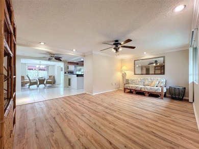 Lakefront Living in Beacon Woods Village with no flood insurance on Beacon Woods Golf Club in Florida - for sale on GolfHomes.com, golf home, golf lot
