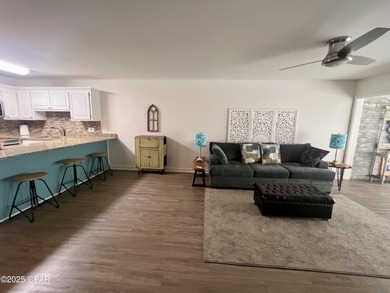 This spacious second-story unit offers unparalleled views of on Bay Point Resort Golf Club in Florida - for sale on GolfHomes.com, golf home, golf lot