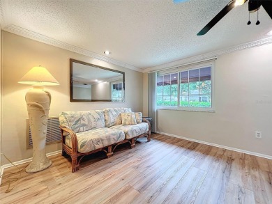 Lakefront Living in Beacon Woods Village with no flood insurance on Beacon Woods Golf Club in Florida - for sale on GolfHomes.com, golf home, golf lot