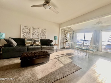 This spacious second-story unit offers unparalleled views of on Bay Point Resort Golf Club in Florida - for sale on GolfHomes.com, golf home, golf lot