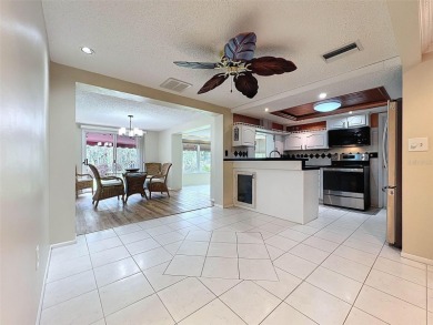 Lakefront Living in Beacon Woods Village with no flood insurance on Beacon Woods Golf Club in Florida - for sale on GolfHomes.com, golf home, golf lot