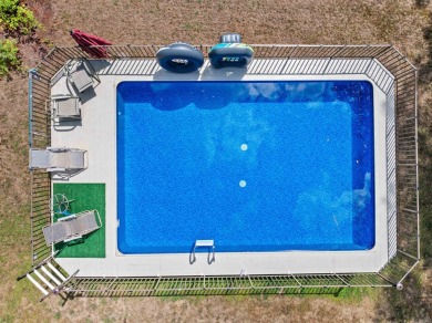 This charming meticulously maintained 3-bedroom 1.5 bath cape on Mojalaki Country Club in New Hampshire - for sale on GolfHomes.com, golf home, golf lot