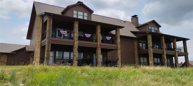 Panoramic view of Possum Kingdom Lake from the covered patio of on The Cliffs Resort in Texas - for sale on GolfHomes.com, golf home, golf lot