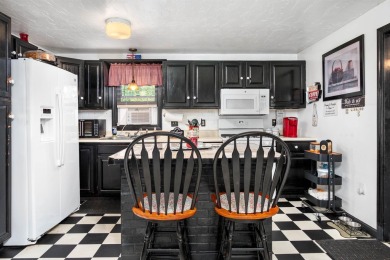 This charming meticulously maintained 3-bedroom 1.5 bath cape on Mojalaki Country Club in New Hampshire - for sale on GolfHomes.com, golf home, golf lot