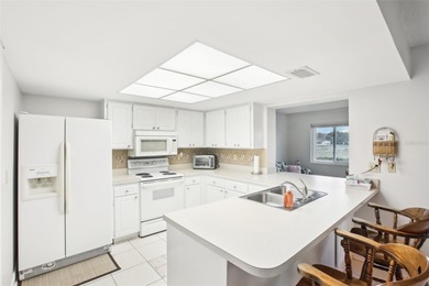 Nestled in the desirable Highgate F community in Kings Point on Falcon Watch Golf Club in Florida - for sale on GolfHomes.com, golf home, golf lot