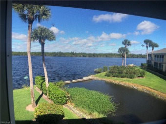 SECOND FLOOR END UNIT WITH STUNNING LAKE VIEWS FROM FRONT TO on Hammock Bay in Florida - for sale on GolfHomes.com, golf home, golf lot