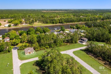 BUILDER WILL INCLUDE REFRIGERATOR AND BLINDS FOR ANY BUYER WHO on The Golf Club of the Wharf in Alabama - for sale on GolfHomes.com, golf home, golf lot