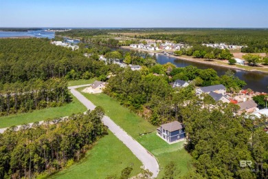 BUILDER WILL INCLUDE REFRIGERATOR AND BLINDS FOR ANY BUYER WHO on The Golf Club of the Wharf in Alabama - for sale on GolfHomes.com, golf home, golf lot