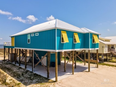 Fall in love with this gorgeous beach house situated on on Isle Dauphine Club Golf Course in Alabama - for sale on GolfHomes.com, golf home, golf lot