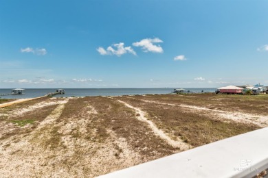 Fall in love with this gorgeous beach house situated on on Isle Dauphine Club Golf Course in Alabama - for sale on GolfHomes.com, golf home, golf lot