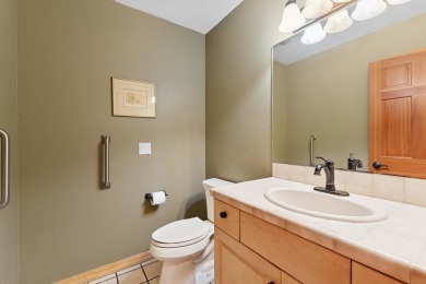 Warm and welcoming, this spacious home at Eagle Bend blends on Eagle Bend Golf Course in Montana - for sale on GolfHomes.com, golf home, golf lot