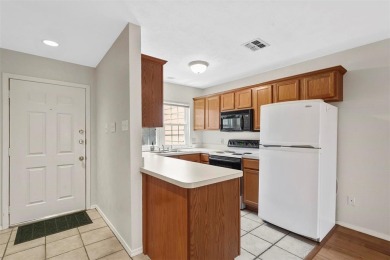 Discover the charm of this beautiful 2BR, 2BA corner condo with on Stevens Park Golf Course in Texas - for sale on GolfHomes.com, golf home, golf lot