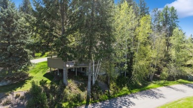 Warm and welcoming, this spacious home at Eagle Bend blends on Eagle Bend Golf Course in Montana - for sale on GolfHomes.com, golf home, golf lot