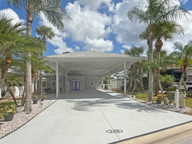 This exquisite RV port features a fully renovated Executive on The Great Outdoors Golf and Country Club in Florida - for sale on GolfHomes.com, golf home, golf lot