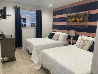 Enjoy coastal living in this renovated 2-bedroom, 2-bath on Seascape Golf Course in Florida - for sale on GolfHomes.com, golf home, golf lot