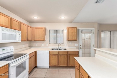 Charming Southwestern-style 3-bed, 2-bath home on a spacious on Arizona City Golf Club in Arizona - for sale on GolfHomes.com, golf home, golf lot