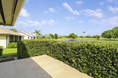 Enjoy panoramic lake and golf course views from this well on Heritage Ridge Golf Club in Florida - for sale on GolfHomes.com, golf home, golf lot