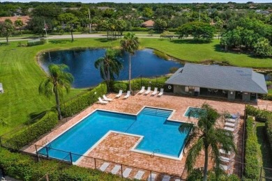 Enjoy panoramic lake and golf course views from this well on Heritage Ridge Golf Club in Florida - for sale on GolfHomes.com, golf home, golf lot