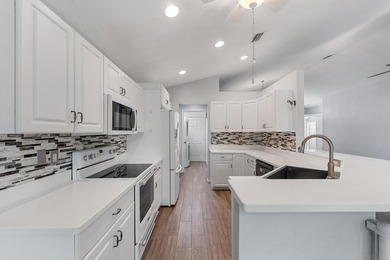 Nestled in the heart of the sought after community The Cottages on Hobe Sound Golf Club in Florida - for sale on GolfHomes.com, golf home, golf lot