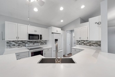 Nestled in the heart of the sought after community The Cottages on Hobe Sound Golf Club in Florida - for sale on GolfHomes.com, golf home, golf lot