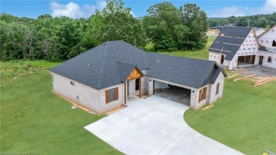 This charming 3-bedroom, 2-bathroom home by K.C. Colley on Vache-Grasse Country Club in Arkansas - for sale on GolfHomes.com, golf home, golf lot