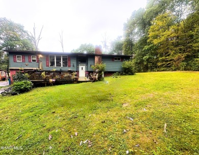 Located on a sprawling one-acre lot, this bi-level home offers on Iron Masters Country Club in Pennsylvania - for sale on GolfHomes.com, golf home, golf lot