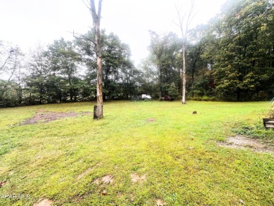 Located on a sprawling one-acre lot, this bi-level home offers on Iron Masters Country Club in Pennsylvania - for sale on GolfHomes.com, golf home, golf lot