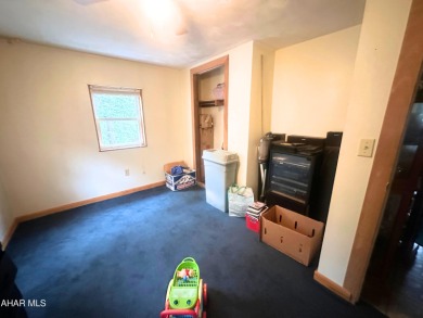 Located on a sprawling one-acre lot, this bi-level home offers on Iron Masters Country Club in Pennsylvania - for sale on GolfHomes.com, golf home, golf lot