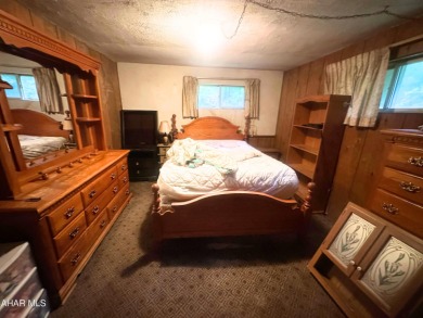 Located on a sprawling one-acre lot, this bi-level home offers on Iron Masters Country Club in Pennsylvania - for sale on GolfHomes.com, golf home, golf lot