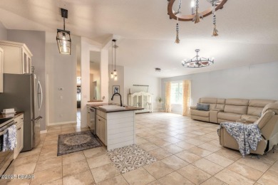 Don't Miss out on this Pool Home in Beautiful Plantation Bay on Plantation Bay Golf and Country Club in Florida - for sale on GolfHomes.com, golf home, golf lot