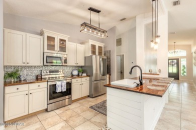 Don't Miss out on this Pool Home in Beautiful Plantation Bay on Plantation Bay Golf and Country Club in Florida - for sale on GolfHomes.com, golf home, golf lot