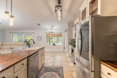Don't Miss out on this Pool Home in Beautiful Plantation Bay on Plantation Bay Golf and Country Club in Florida - for sale on GolfHomes.com, golf home, golf lot