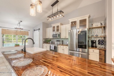Don't Miss out on this Pool Home in Beautiful Plantation Bay on Plantation Bay Golf and Country Club in Florida - for sale on GolfHomes.com, golf home, golf lot