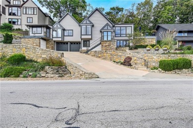 Experience the best of lake living in this extraordinary Lake on Lake Quivira Country Club in Kansas - for sale on GolfHomes.com, golf home, golf lot
